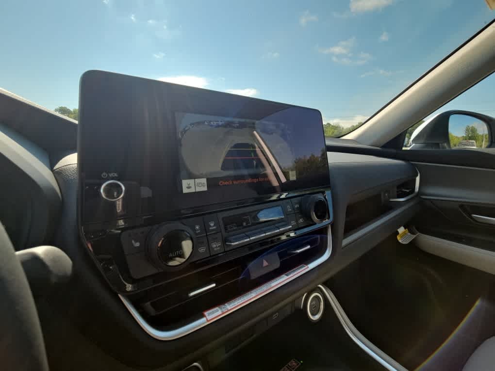 New 2026 Celestial Silver Metallic Toyota Hybrid XLE image 12