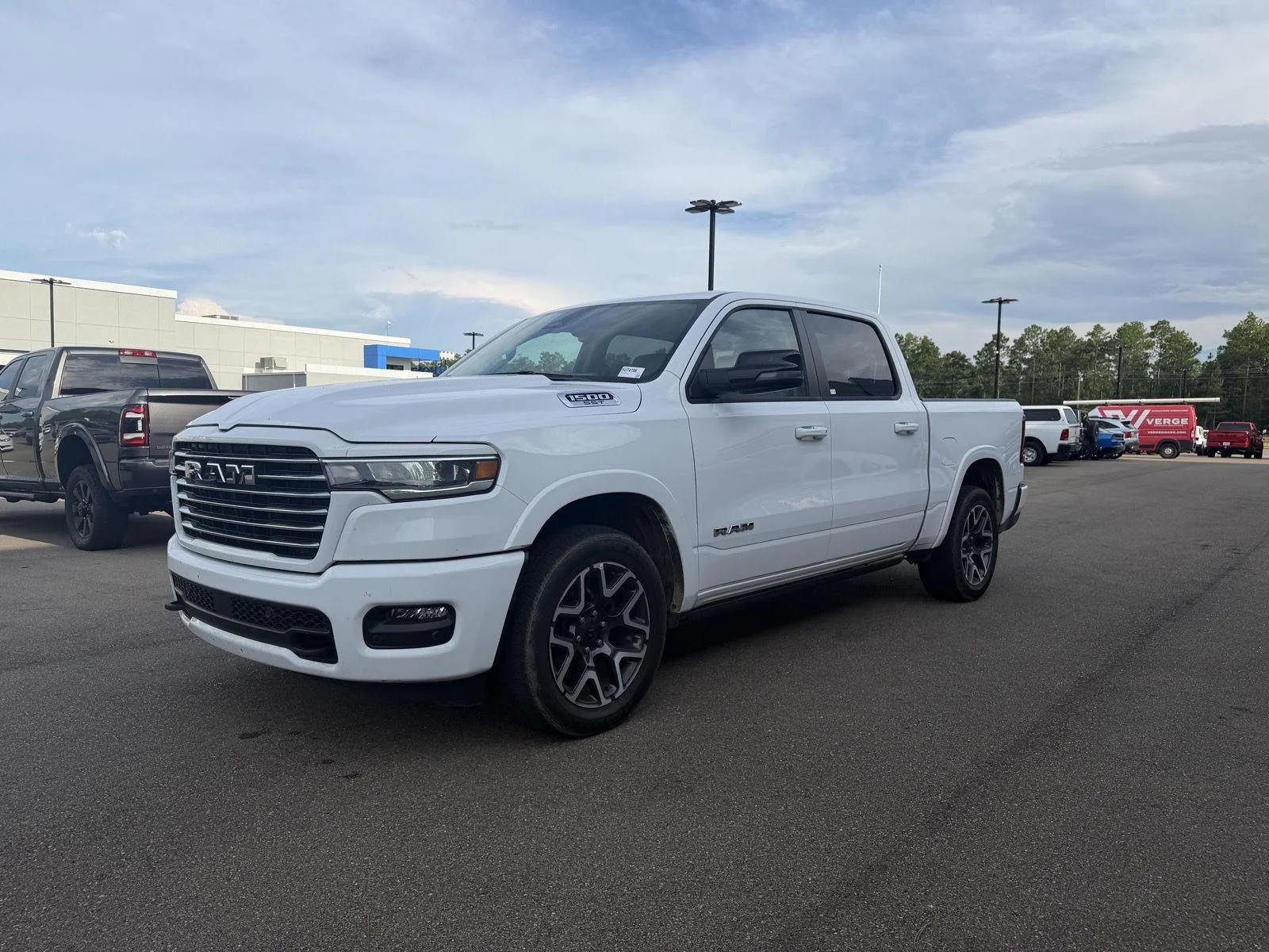 Used 2025 Bright White Clearcoat Ram Laramie image 1