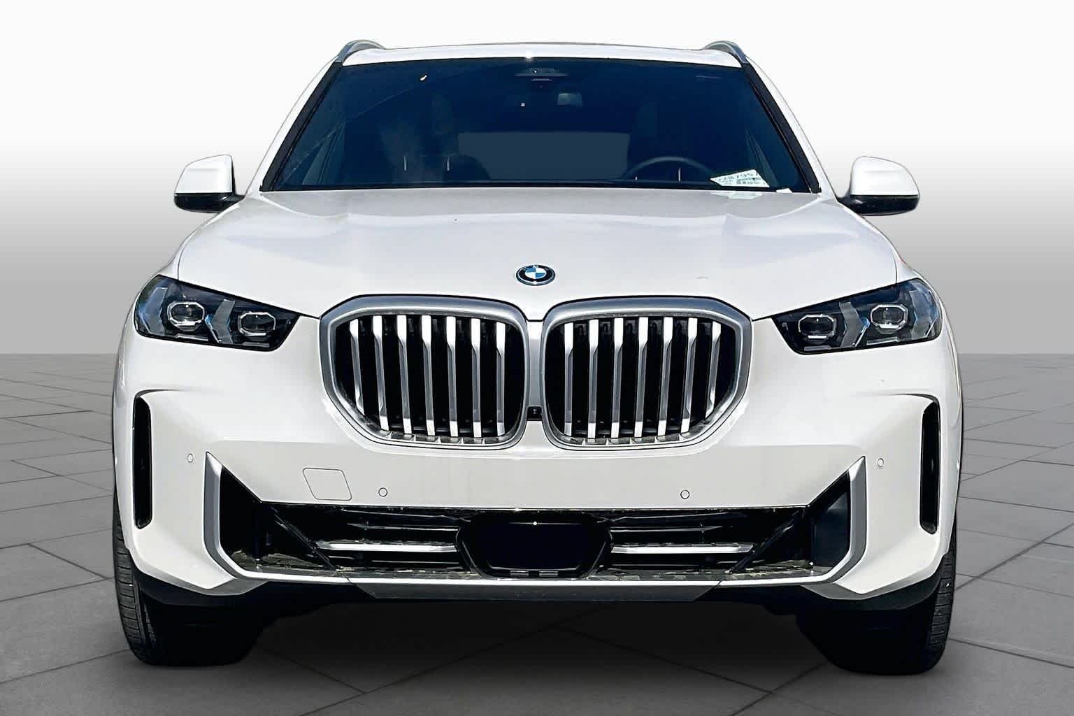 Used 2026 Mineral White Metallic BMW xDrive50e image 3