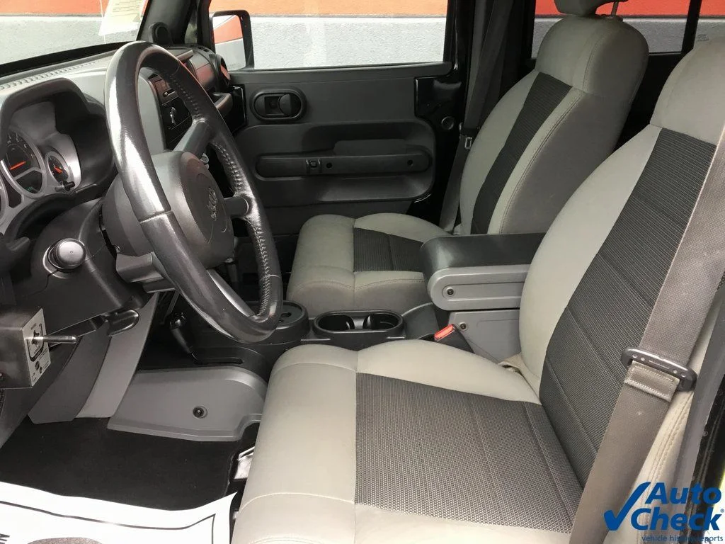 Used 2010 Black Jeep Unlimited Sport image 15