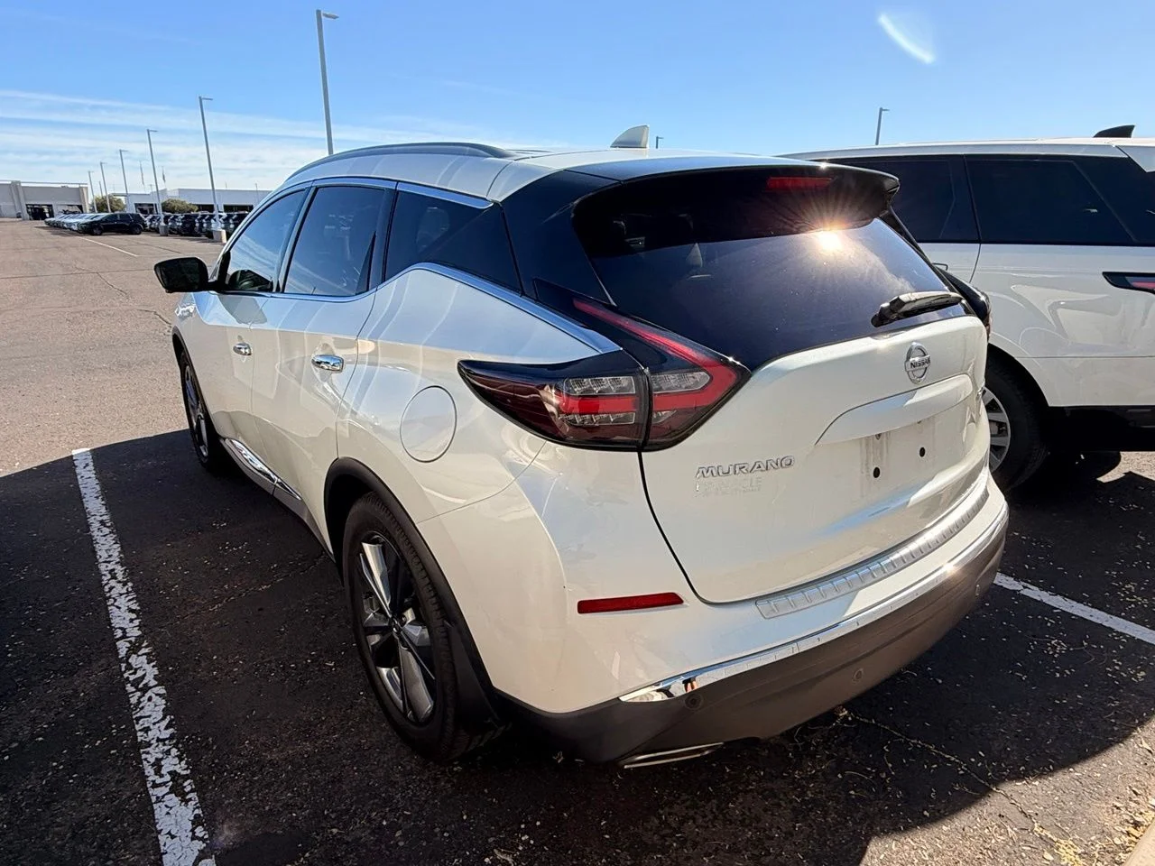 Used 2021 Pearl White Nissan Platinum image 6