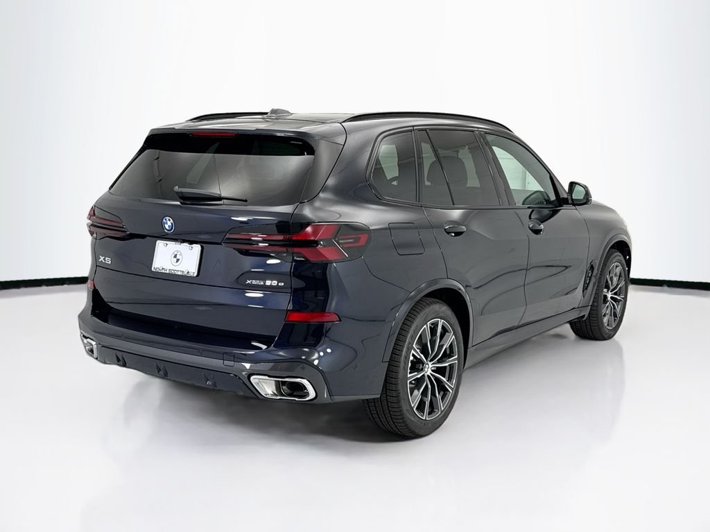 New 2026 Carbon Black Metallic BMW xDrive50e image 5