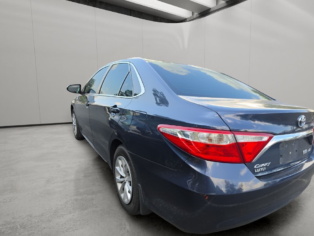 Used 2015 Toyota Camry LE Hybrid with VIN 4T1BD1FKXFU142882 for sale in Matthews, NC