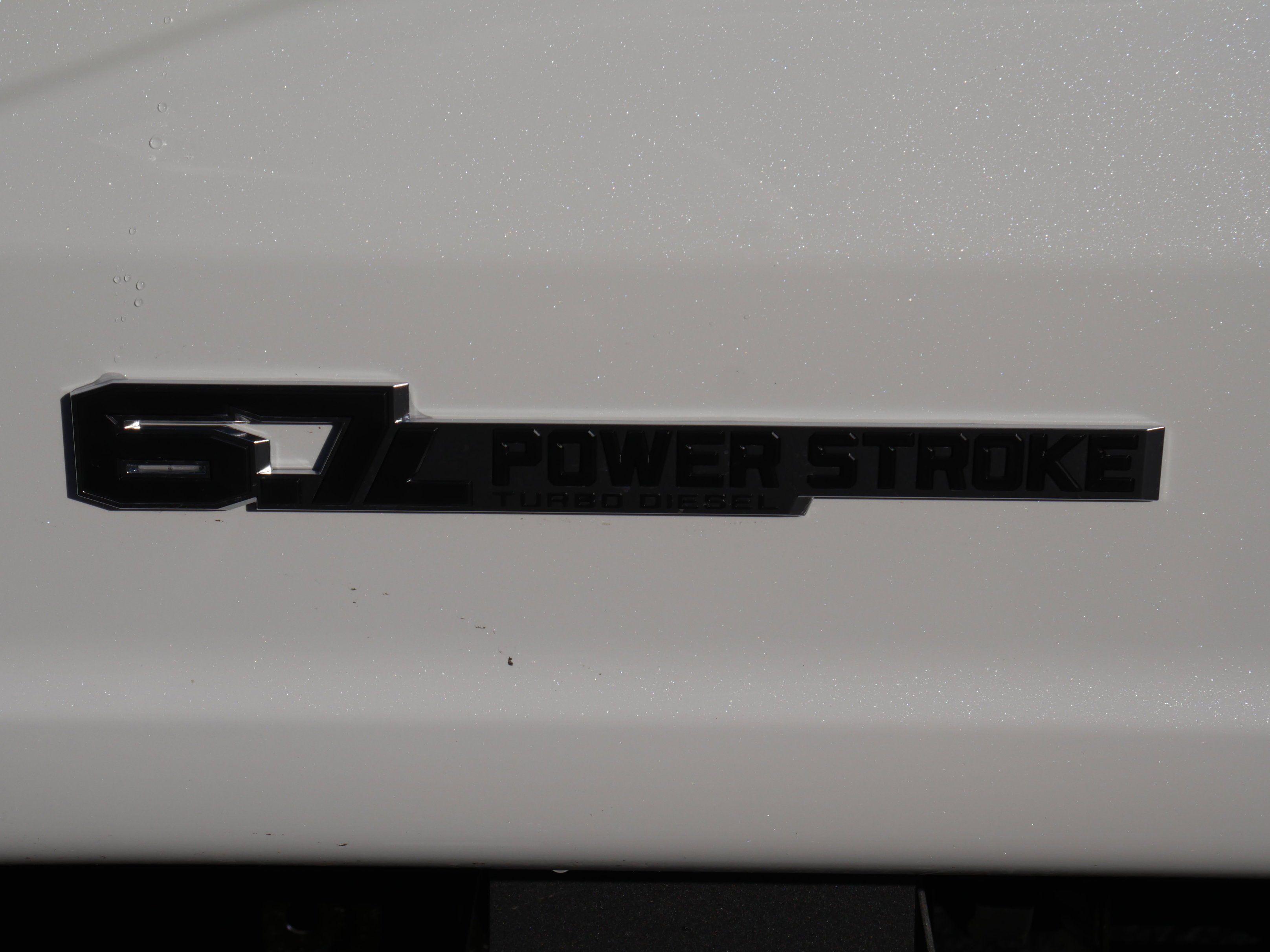 New 2026 Star White Metallic Tri-Coat Ford F-350® Lariat® image 21