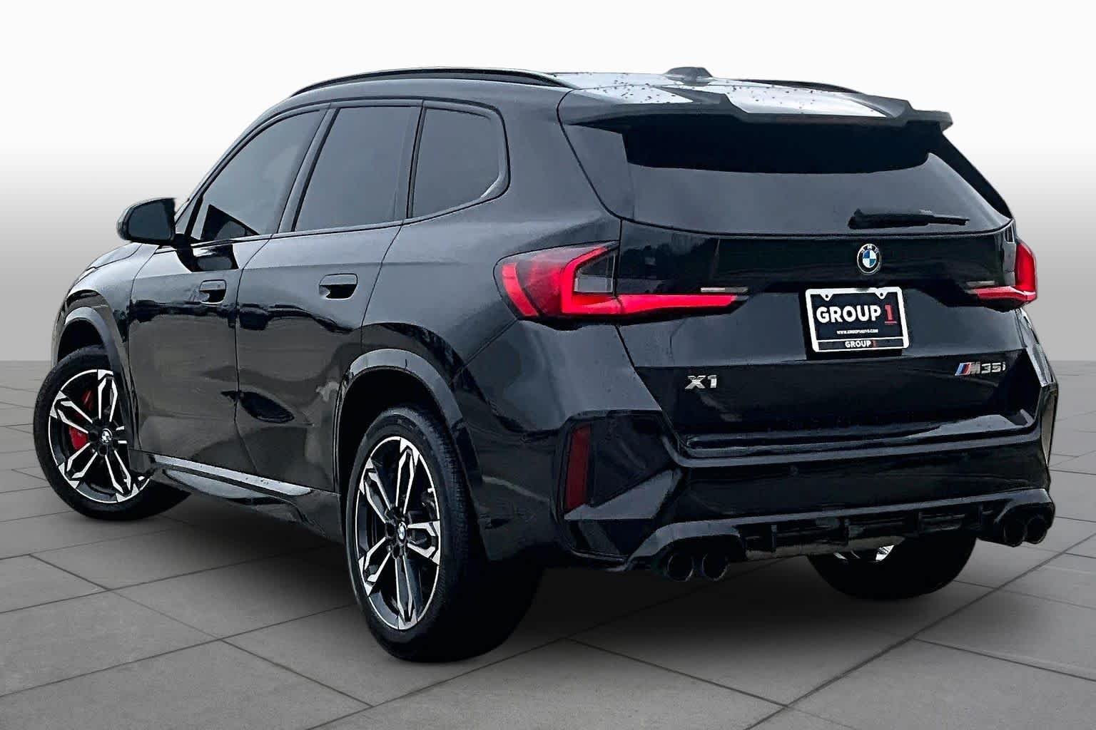 Used 2024 Black Sapphire Metallic BMW M35i image 11