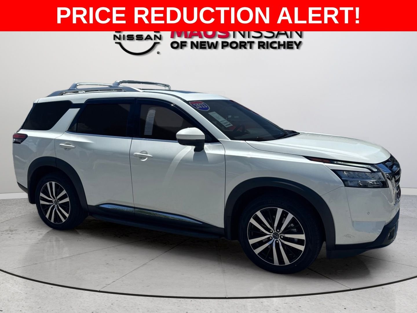 Used 2023 Pearl White Nissan Platinum image 1