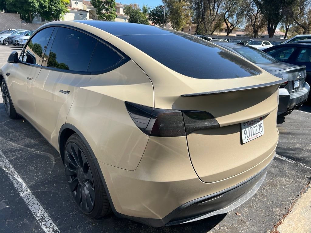 Used 2023 Solid Black Tesla Performance image 6