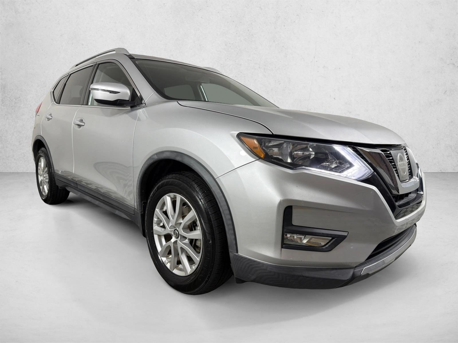 Used 2017 Brilliant Silver Nissan SV image 1