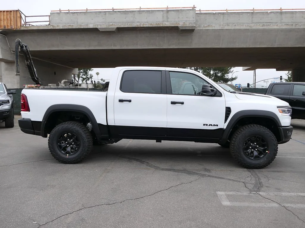 New 2026 Bright White Clearcoat RAM RHO Crew Cab 4x4 5