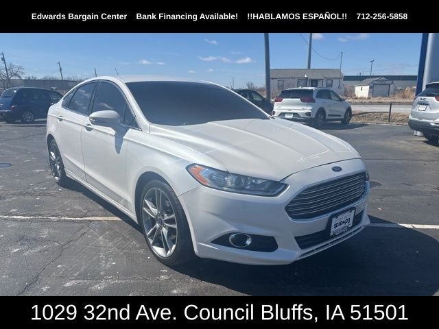 Used 2016 Ford Fusion Titanium with VIN 3FA6P0K96GR144024 for sale in Council Bluffs, IA