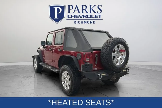 Used 2013 Red Jeep Unlimited Sahara image 6