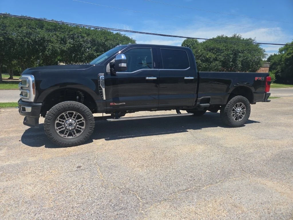 Used 2024 Black Metallic Ford Limited image 3