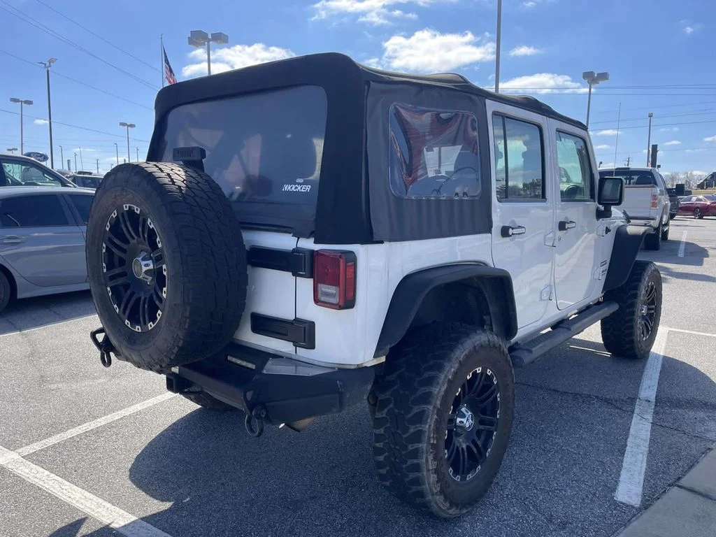 Used 2015 White Jeep Unlimited Sport image 3