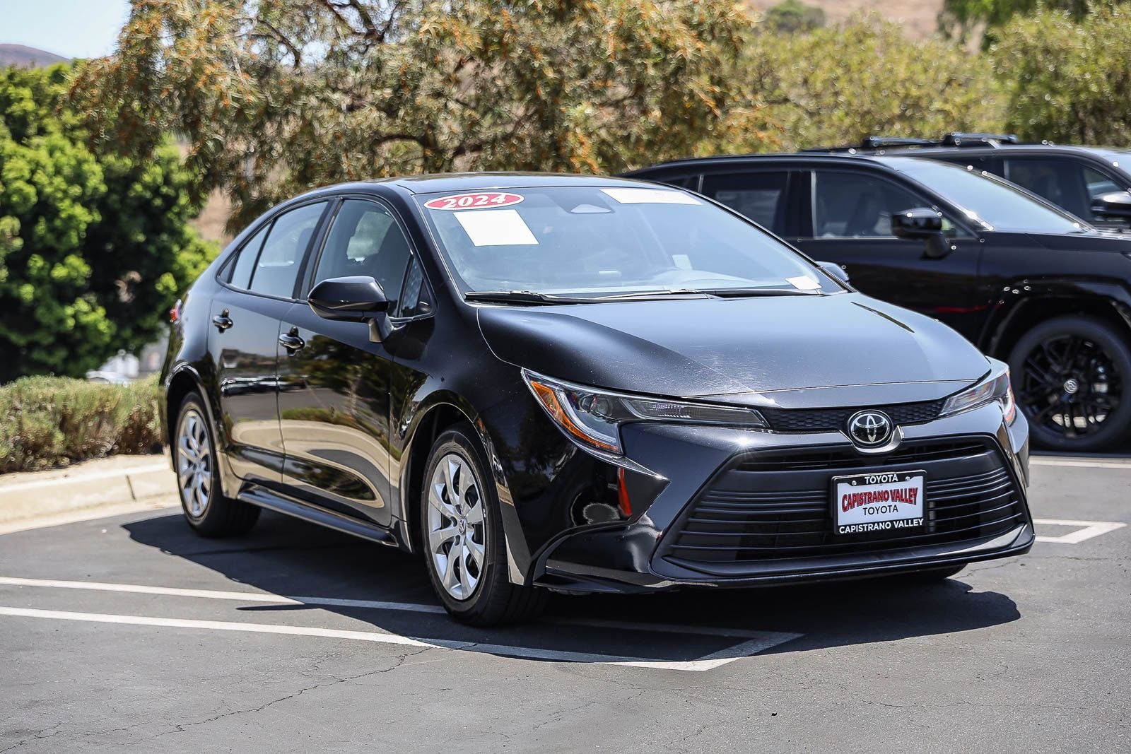 Certified Used 2024 MIDNIGHT BLACK METAL Toyota LE image 3