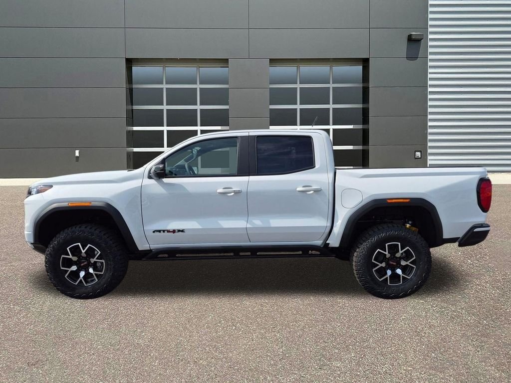 New 2026 Summit White GMC 4WD AT4X image 9