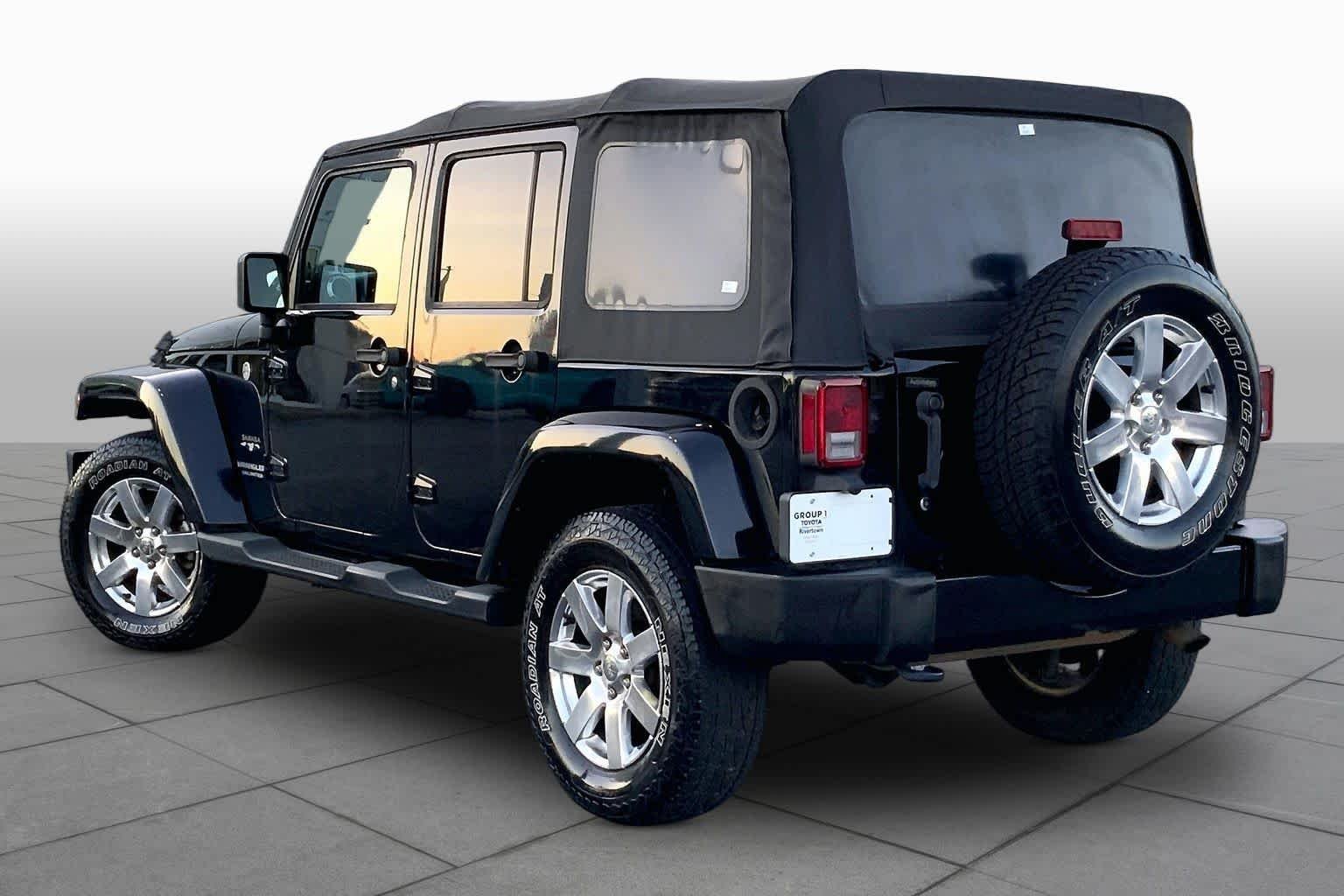 Used 2016 Black Clearcoat Jeep Sahara image 11