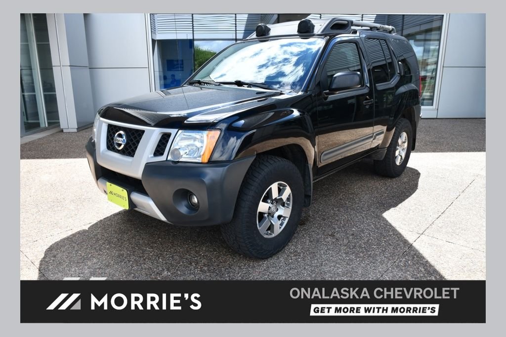 Used 2013 Black Nissan PRO-4X image 1
