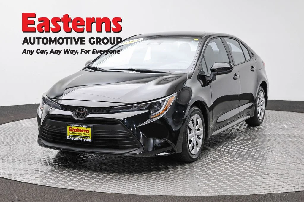 Used 2025 Black Toyota LE image 1