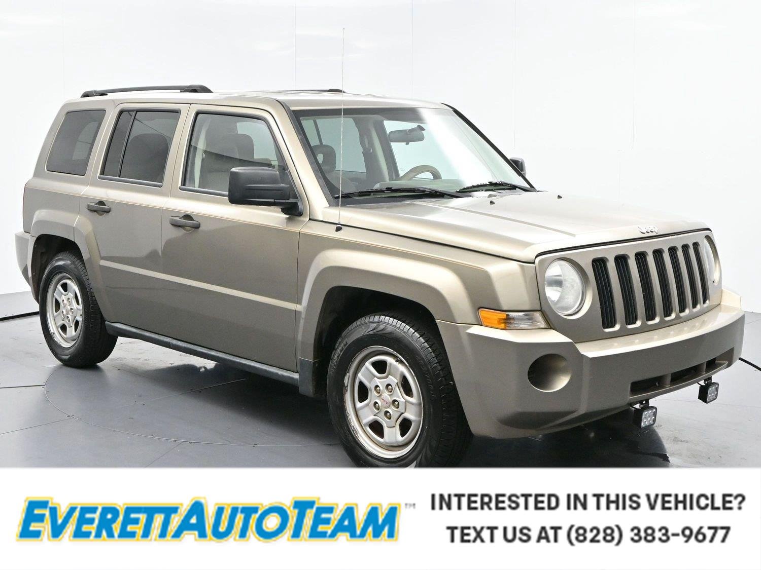 Used 2008 Light Khaki Metallic Jeep Sport image 1