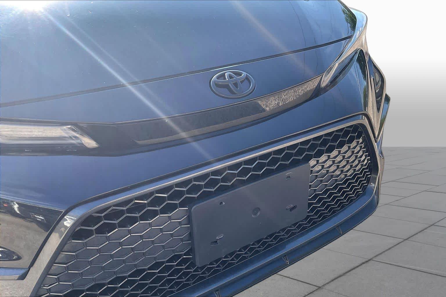 Used 2022 Black Sand Pearl Toyota SE image 29