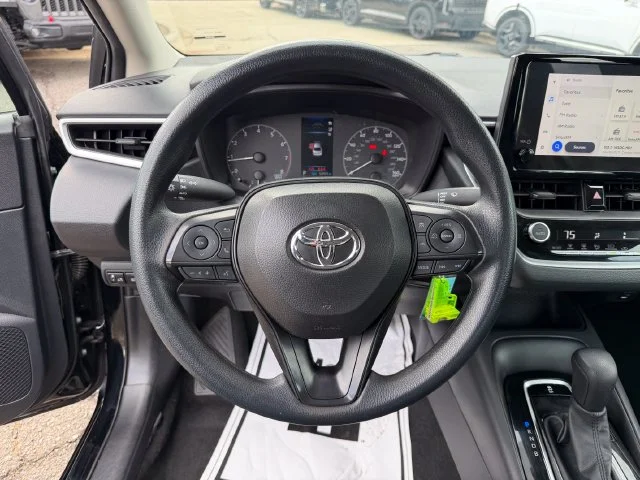 Used 2025 Midnight Black Metallic Toyota LE image 16
