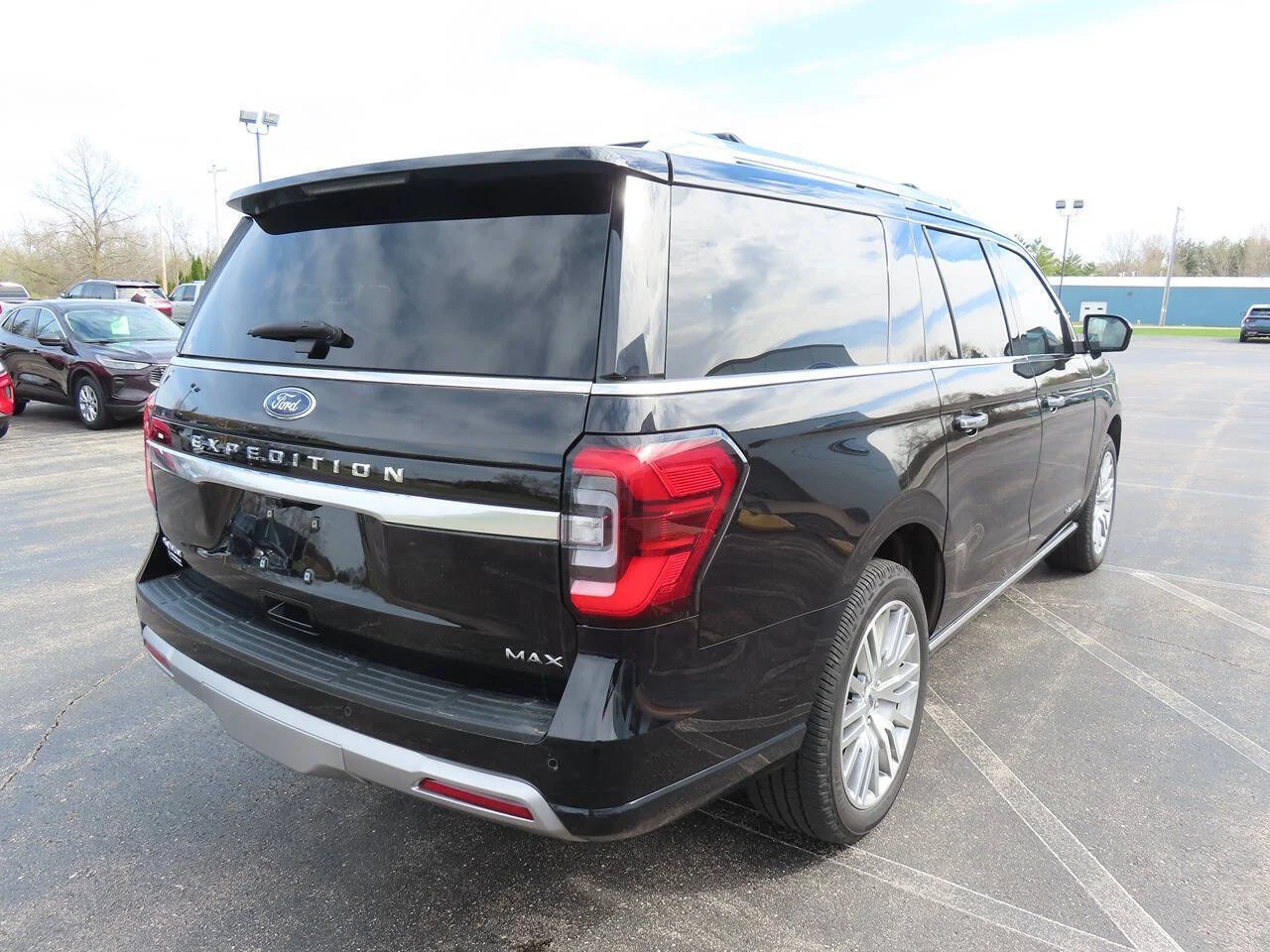 Used 2023 Agate Black Ford Platinum 4x4 4dr SUV image 4