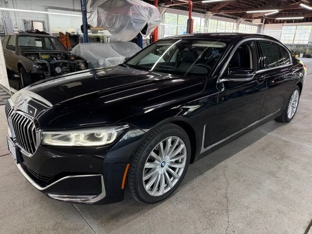Used 2022 Black BMW 740i xDrive image 1