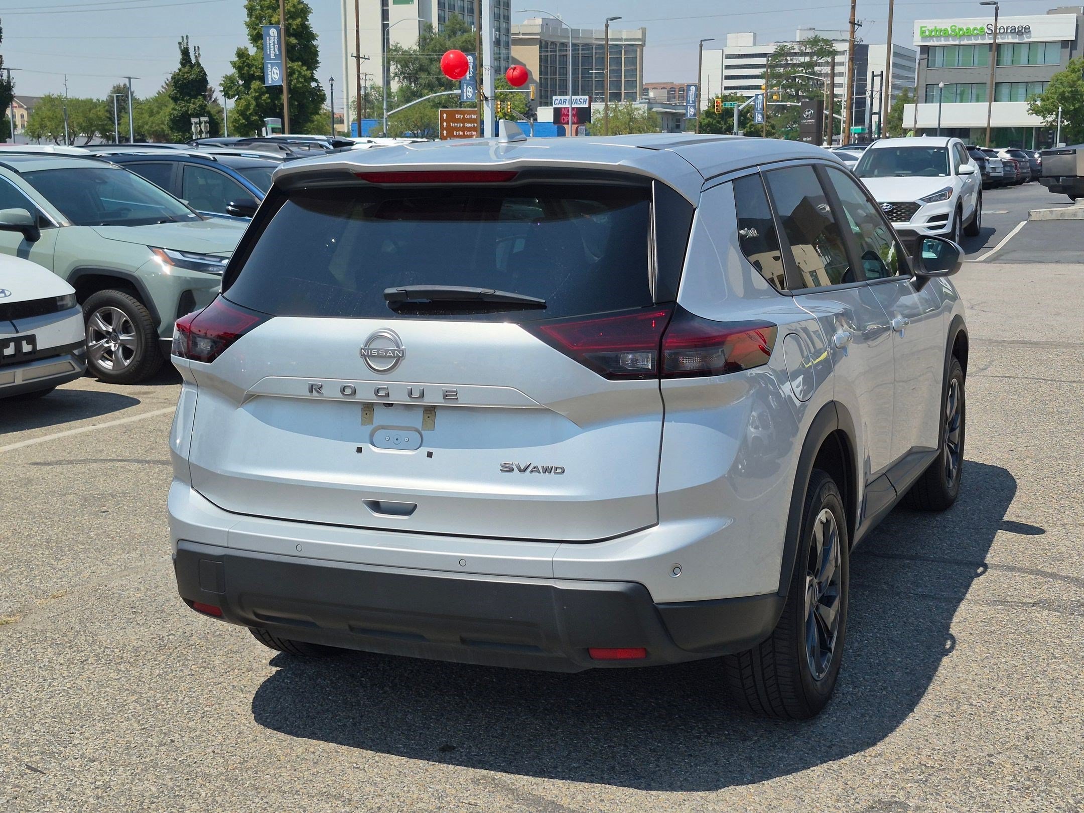 Used 2024 Brilliant Silver Metallic Nissan SV image 3