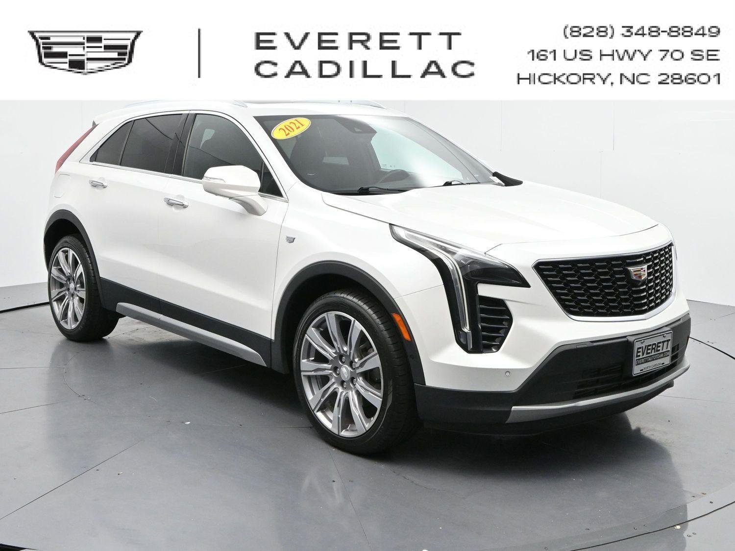 Used 2021 CRYSTAL WHITE TRICOAT Cadillac AWD Premium Luxury image 1