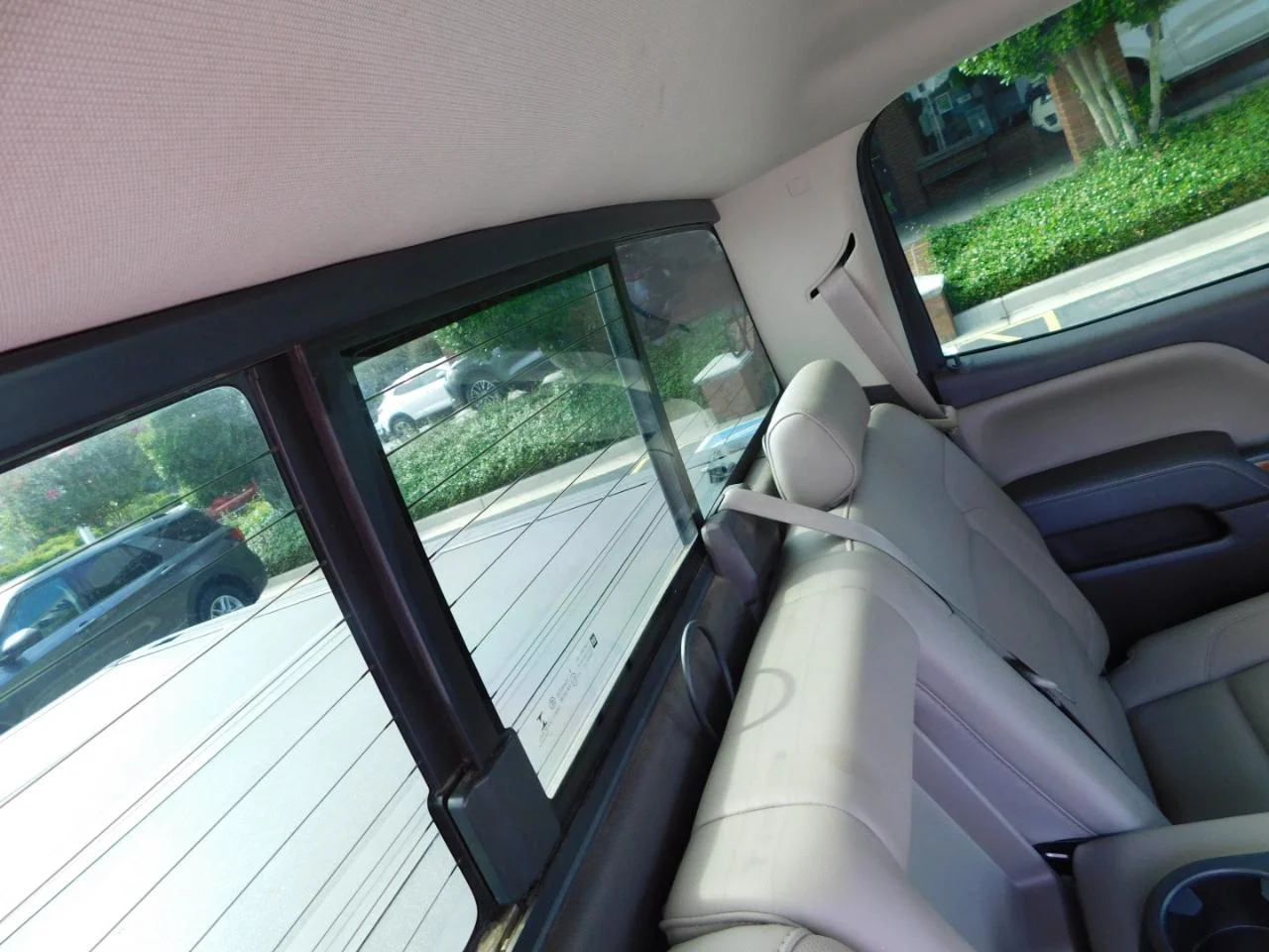 Used 2014 Black GMC 4WD Crew Cab 143.5 in SLT image 16