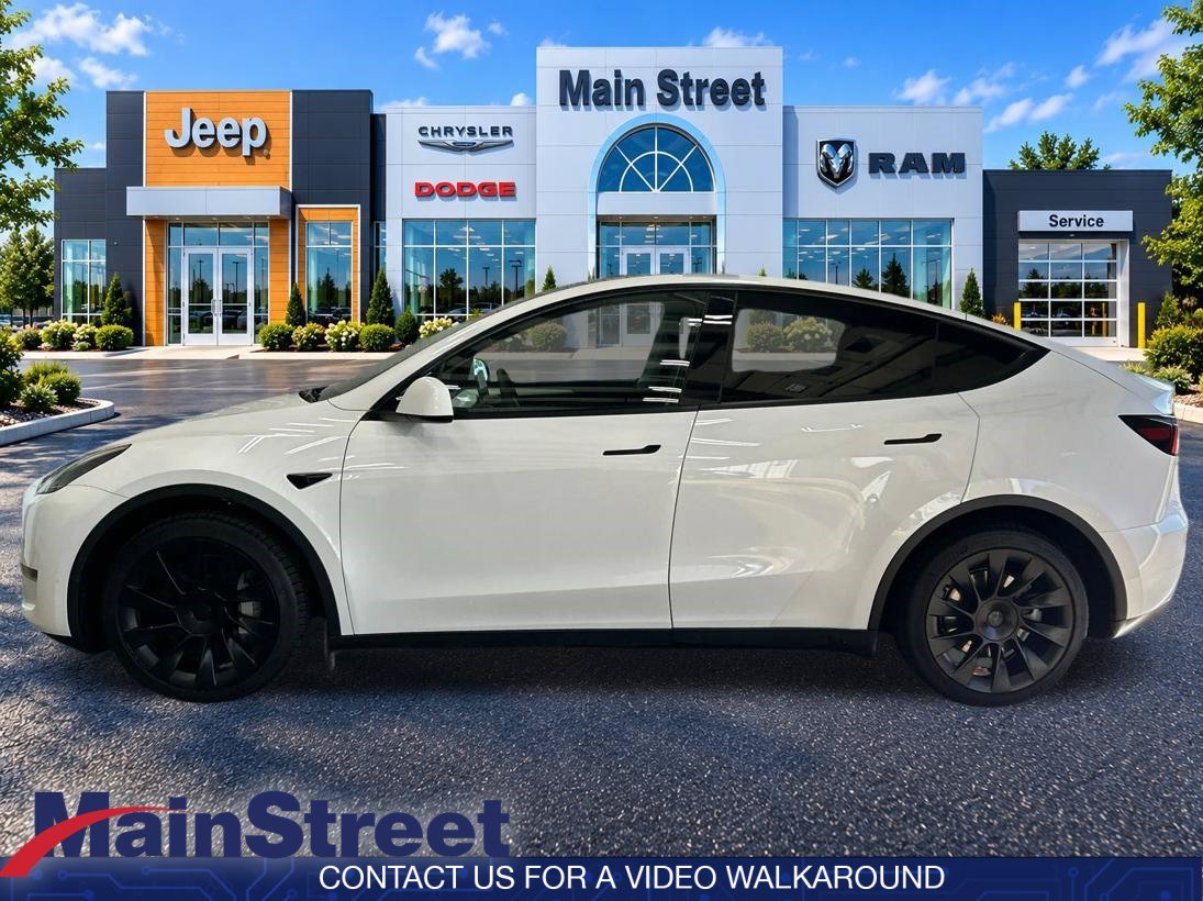 Used 2023 Tesla Model Y Long Range with VIN 7SAYGDEE7PF591338 for sale in Lansing, KS