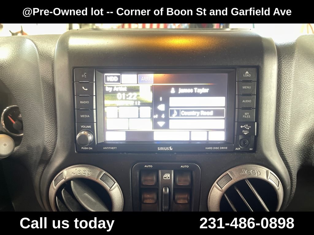 Used 2015 Silver Jeep Unlimited Sport image 23