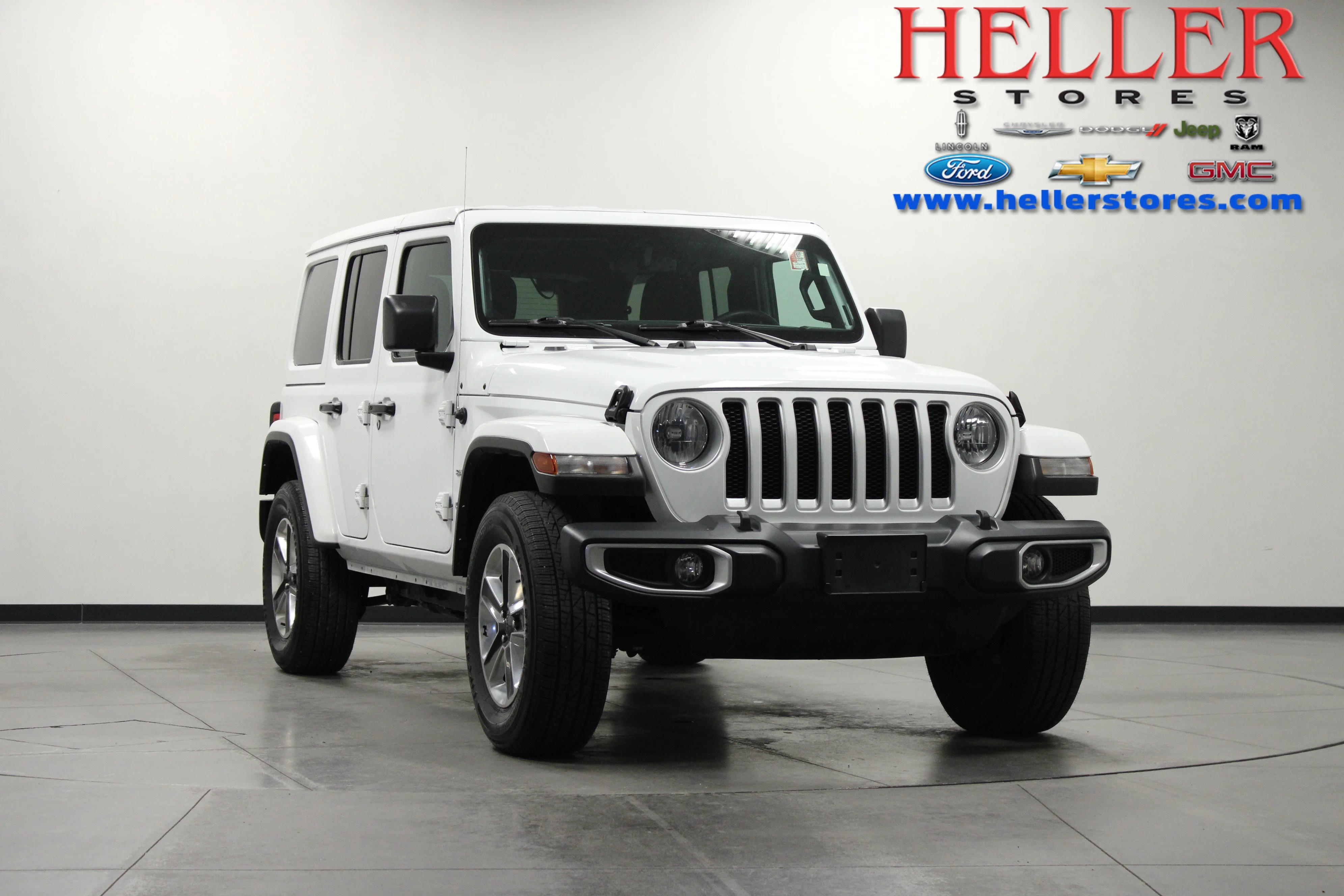 Used 2023 Bright White Clearcoat Jeep Sahara image 1