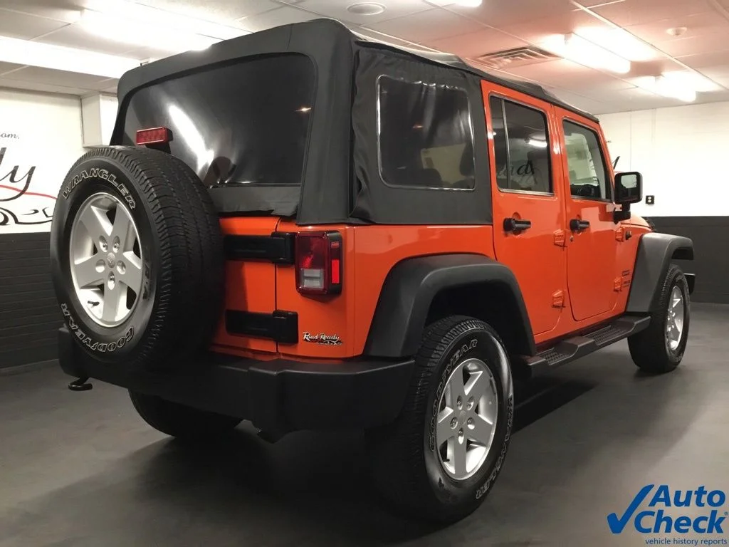 Used 2015 Orange Jeep Unlimited Sport image 10