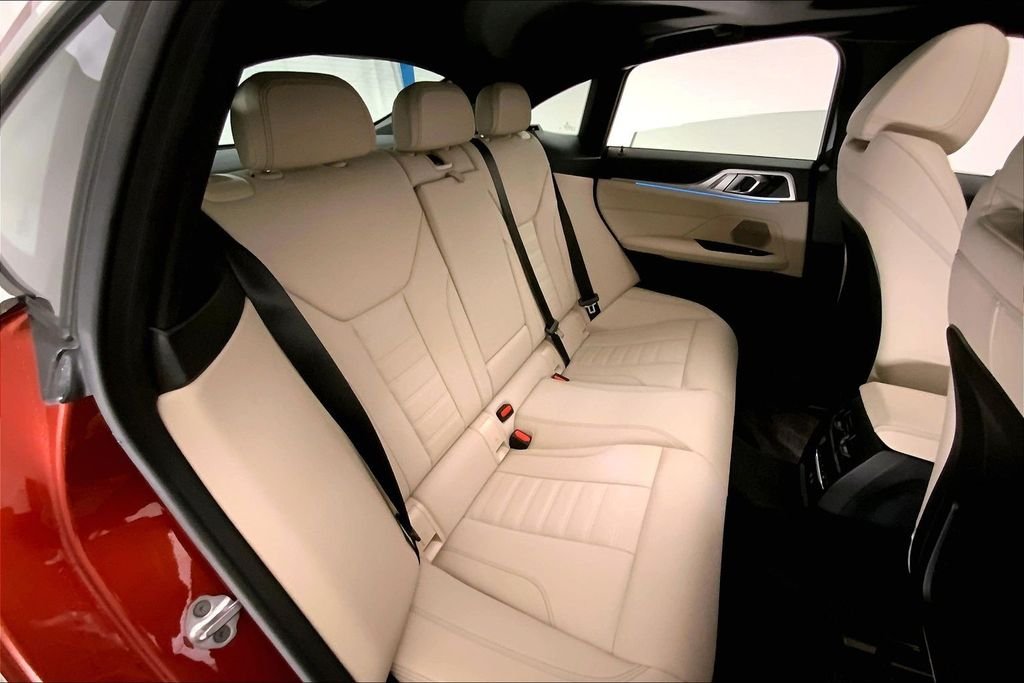 Used 2023 Sunset Orange Metallic BMW  image 14