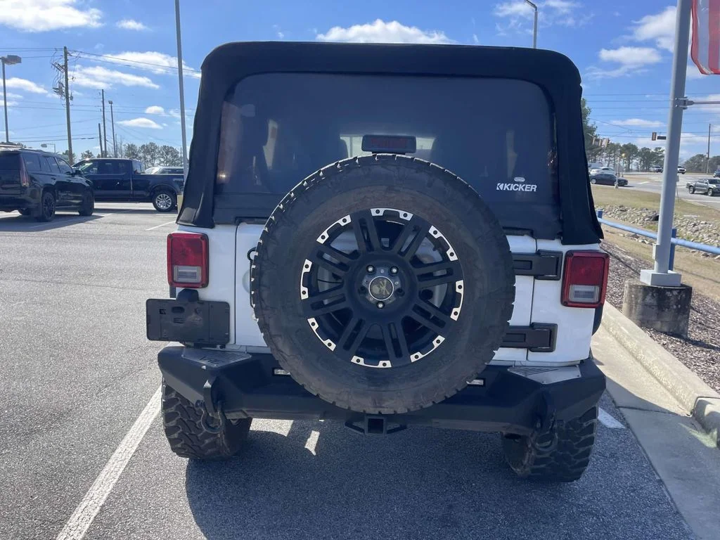 Used 2015 White Jeep Unlimited Sport image 4