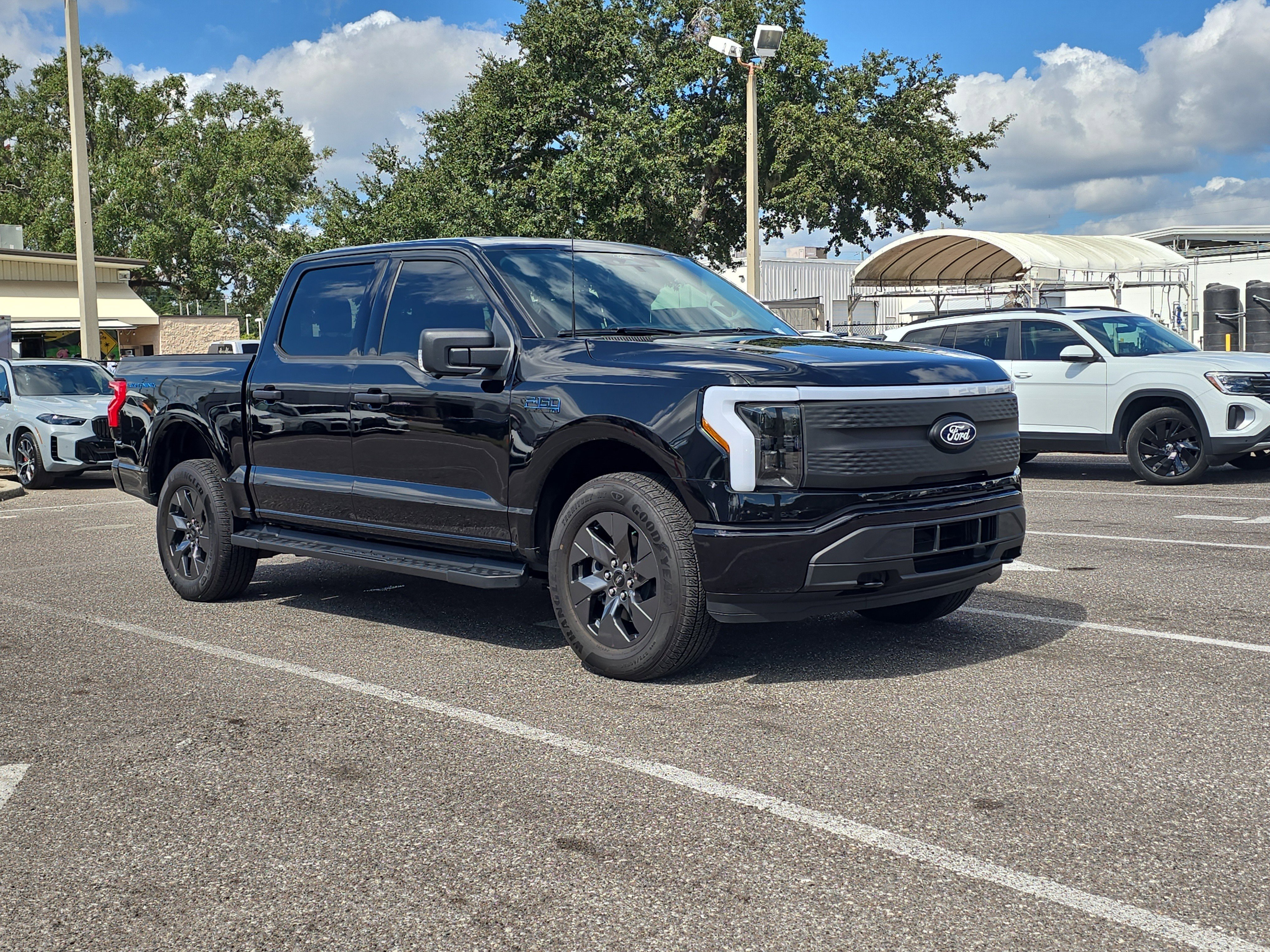 Used 2024 Ford F-150 Lightning XLT with VIN 1FTVW3LK9RWG00836 for sale in Tampa, FL