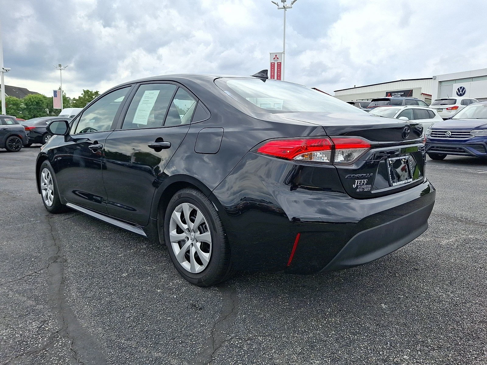 Used 2025 Midnight Black Metallic   218 Toyota LE image 4