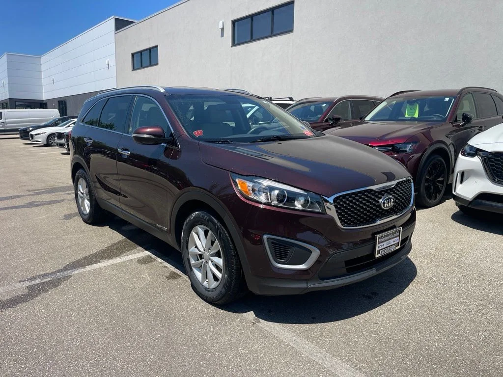 Used 2016 Dark Cherry Kia LX image 4