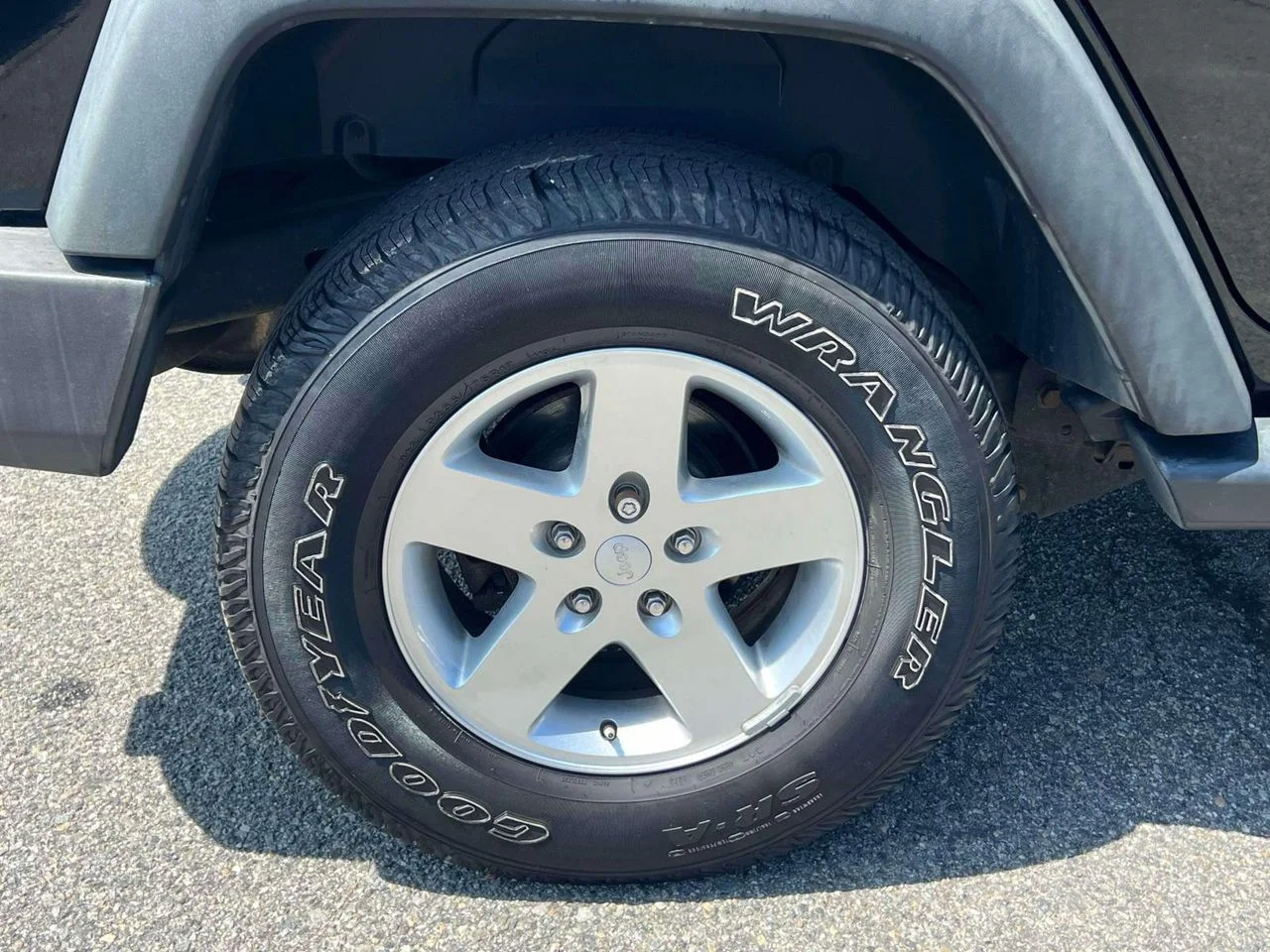 Used 2015 Black Clearcoat Jeep Sport image 11