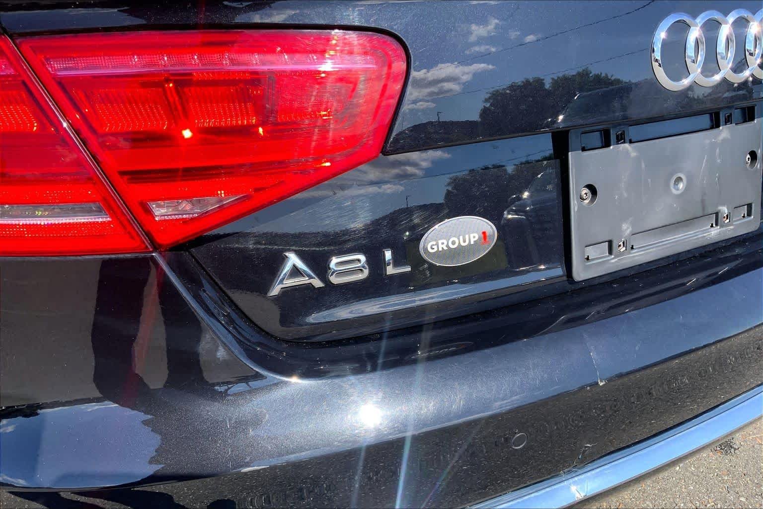 Used 2012 Emerald Black Metallic Audi  image 33
