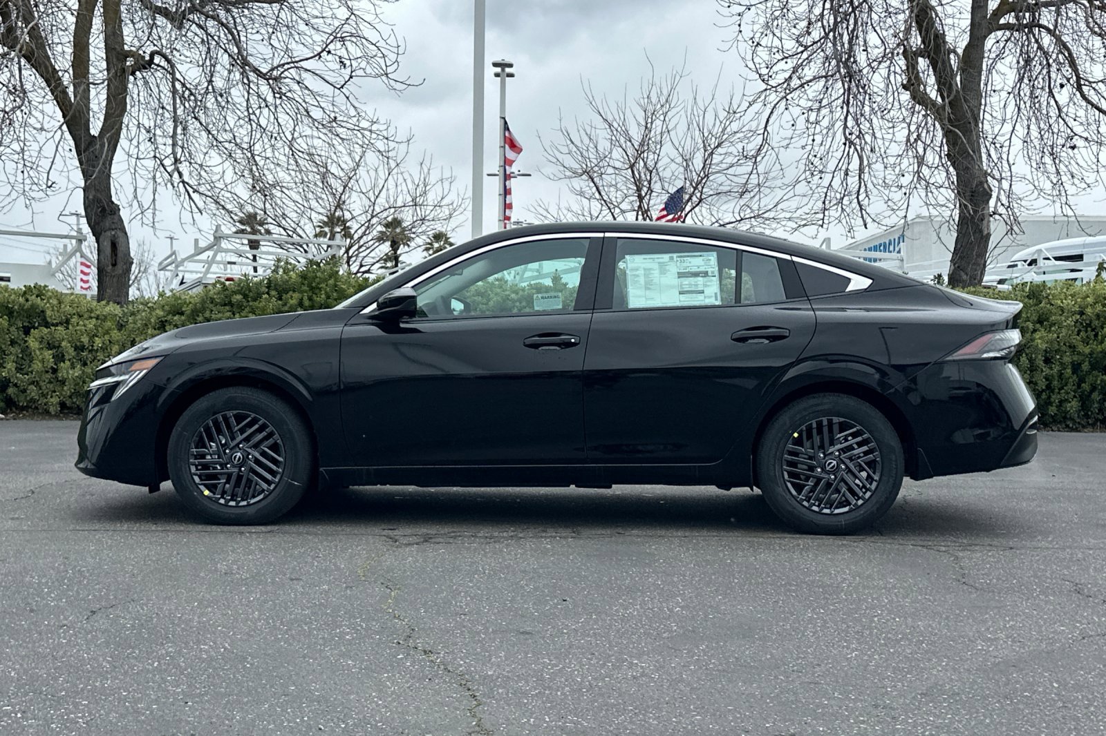 New 2026 Super Black Nissan SV image 7