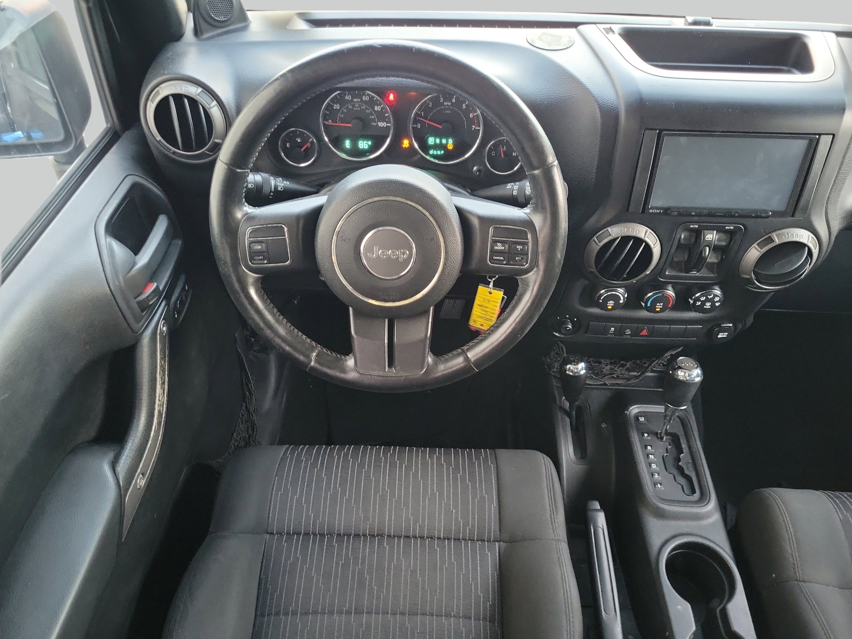 Used 2011 Black ClearCoat Jeep Unlimited Sport image 16