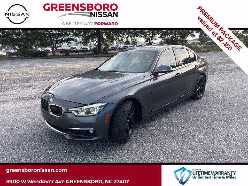 Used 2016 Gray BMW 328i xDrive image 1