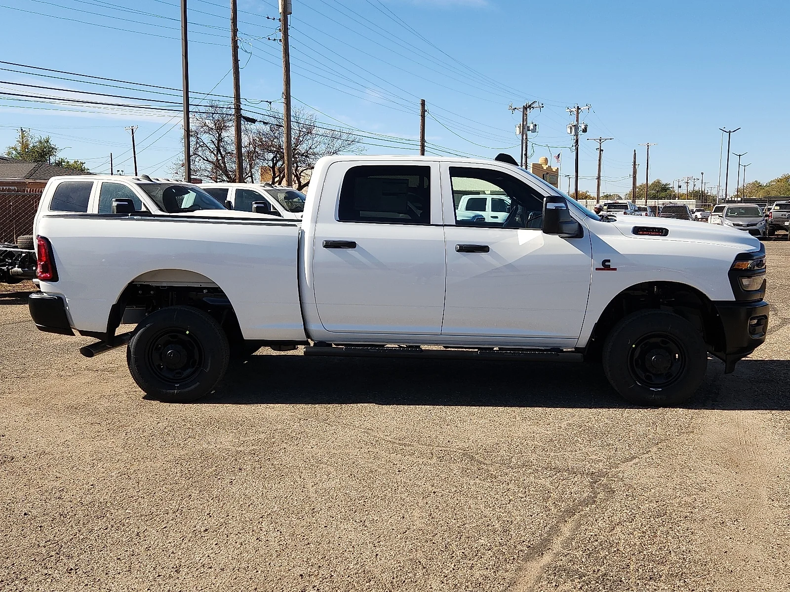New 2026 PW7 Bright Whit Ram TRADESMAN CREW CAB 4X4 6