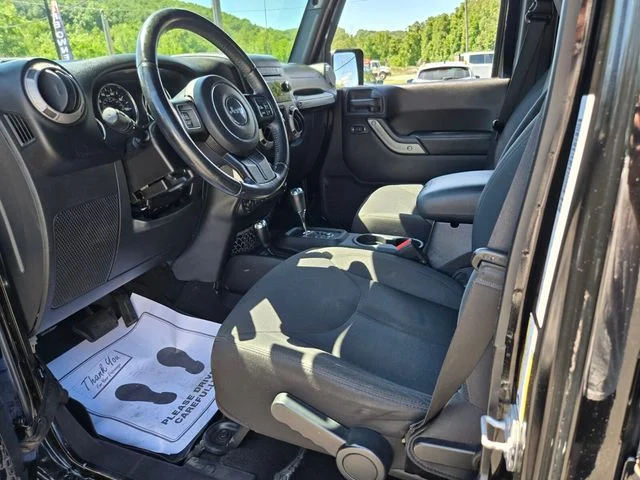 Used 2015 Black Jeep Unlimited Sport image 11