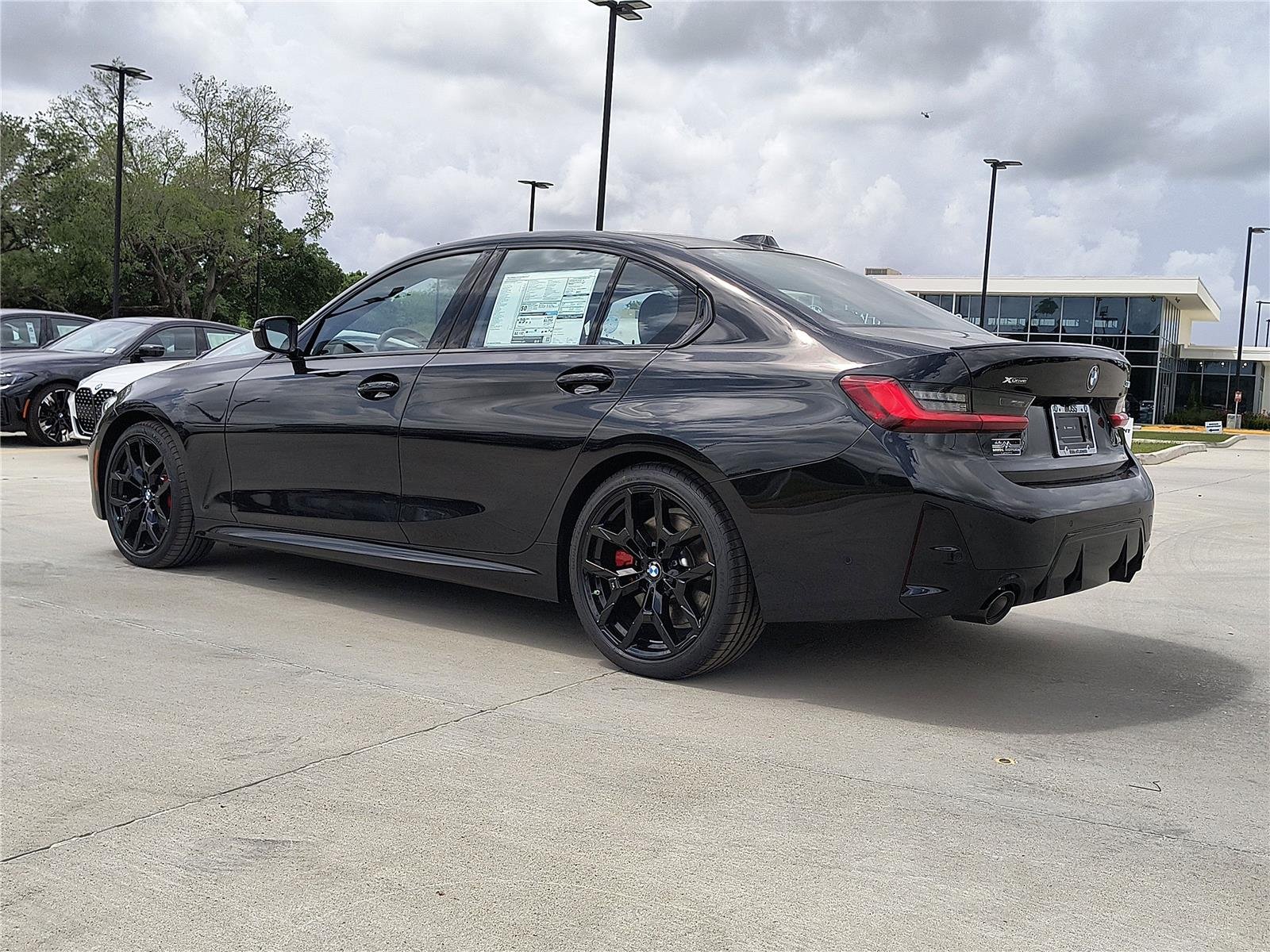 New 2026 Black Sapphire Metallic BMW 330i xDrive image 3