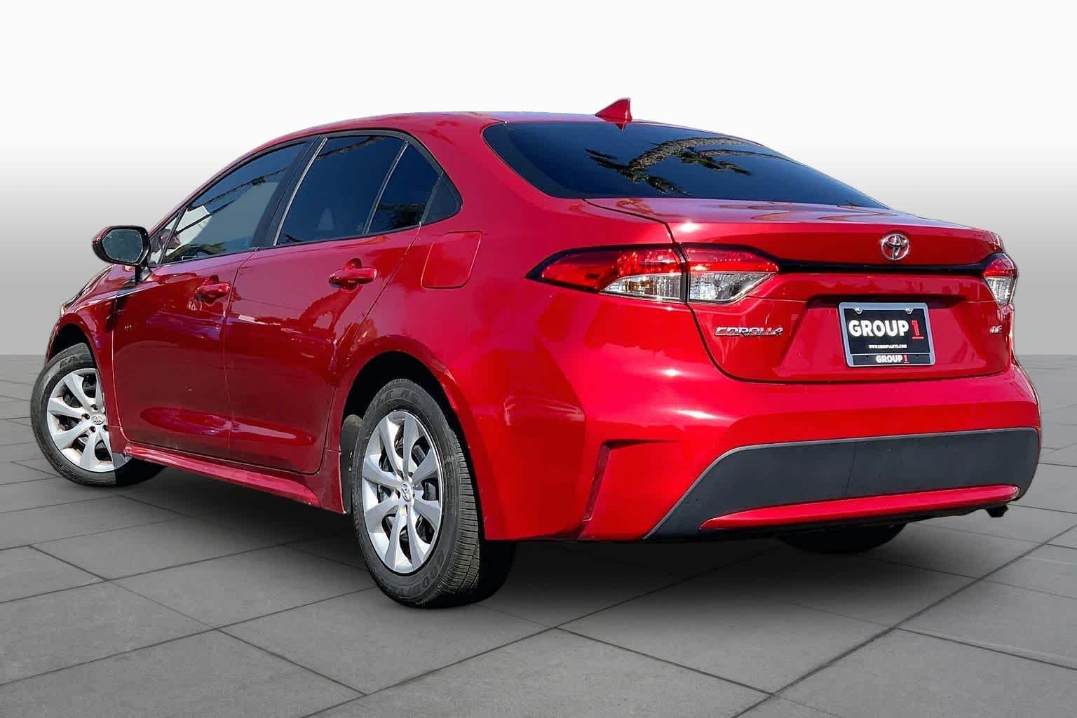 Used 2021 Barcelona Red Metallic Toyota LE image 11
