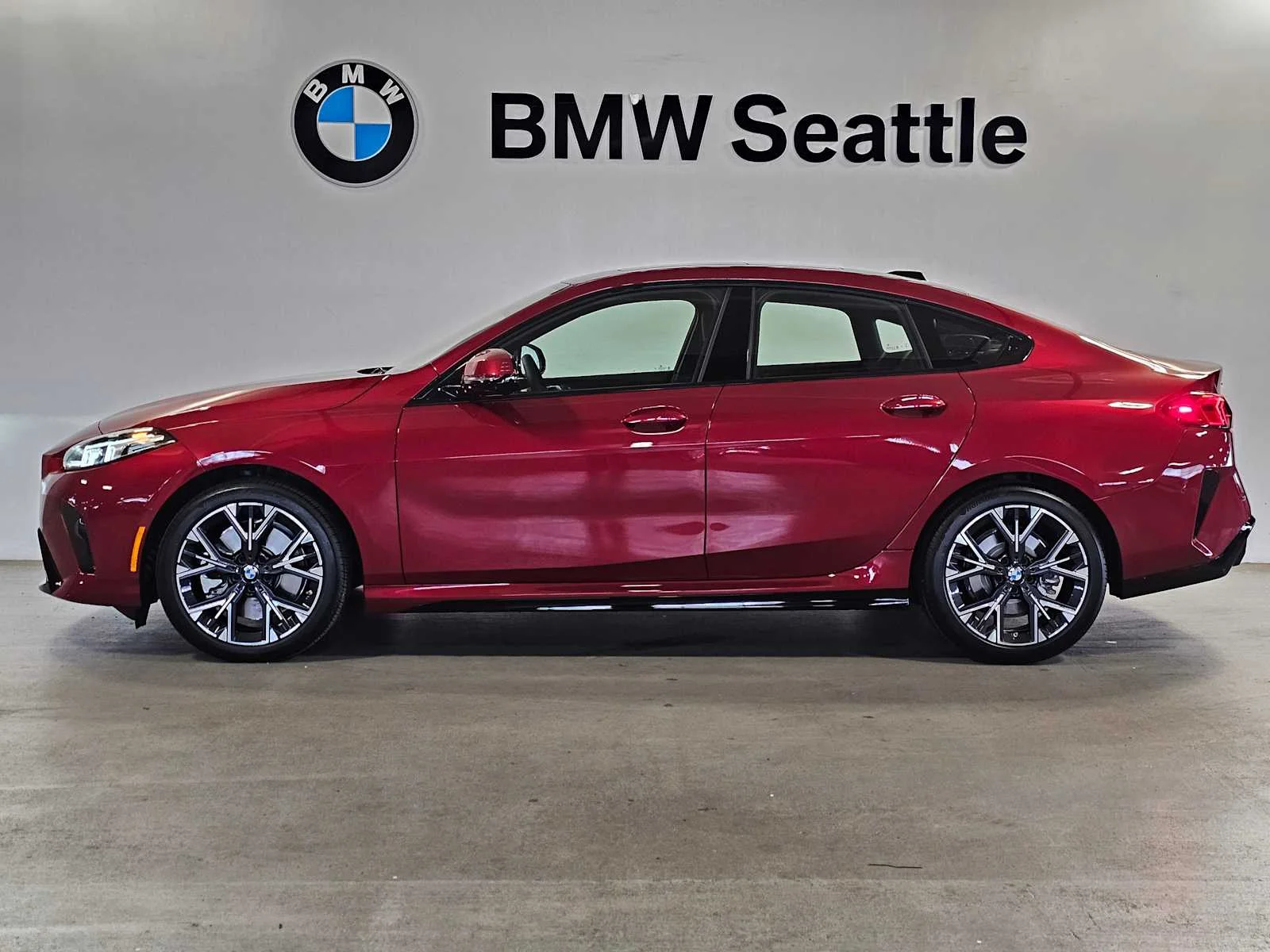 Certified Used 2025 Vegas Red Metallic BMW 228 xDrive image 2