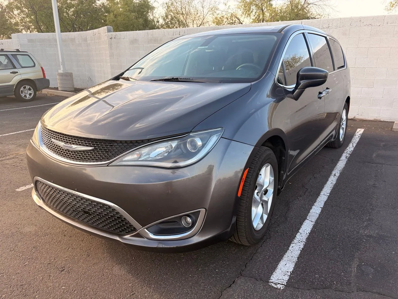 Used 2020 Granite Crystal Metallic Clearcoat Chrysler Touring image 1